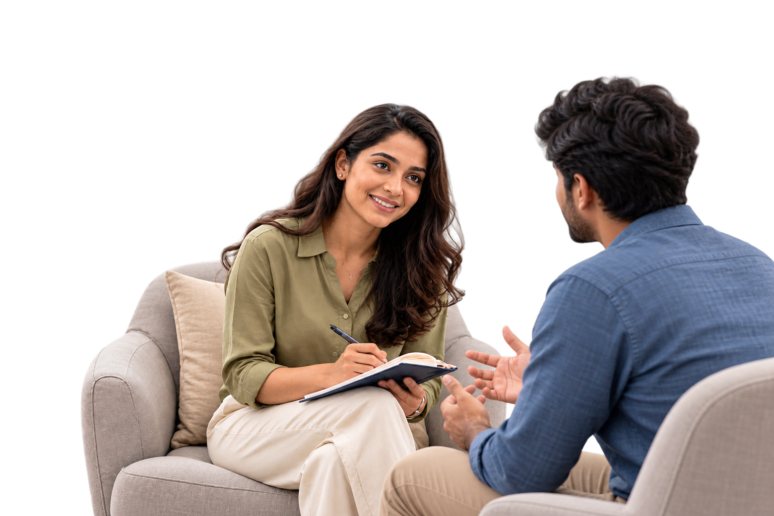 A counsellor taking notes while speaking with an employee